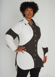 Polka dot poplin duster shirt with elasticized sleeve cuffs and splits at sides. Button fastenings through front.