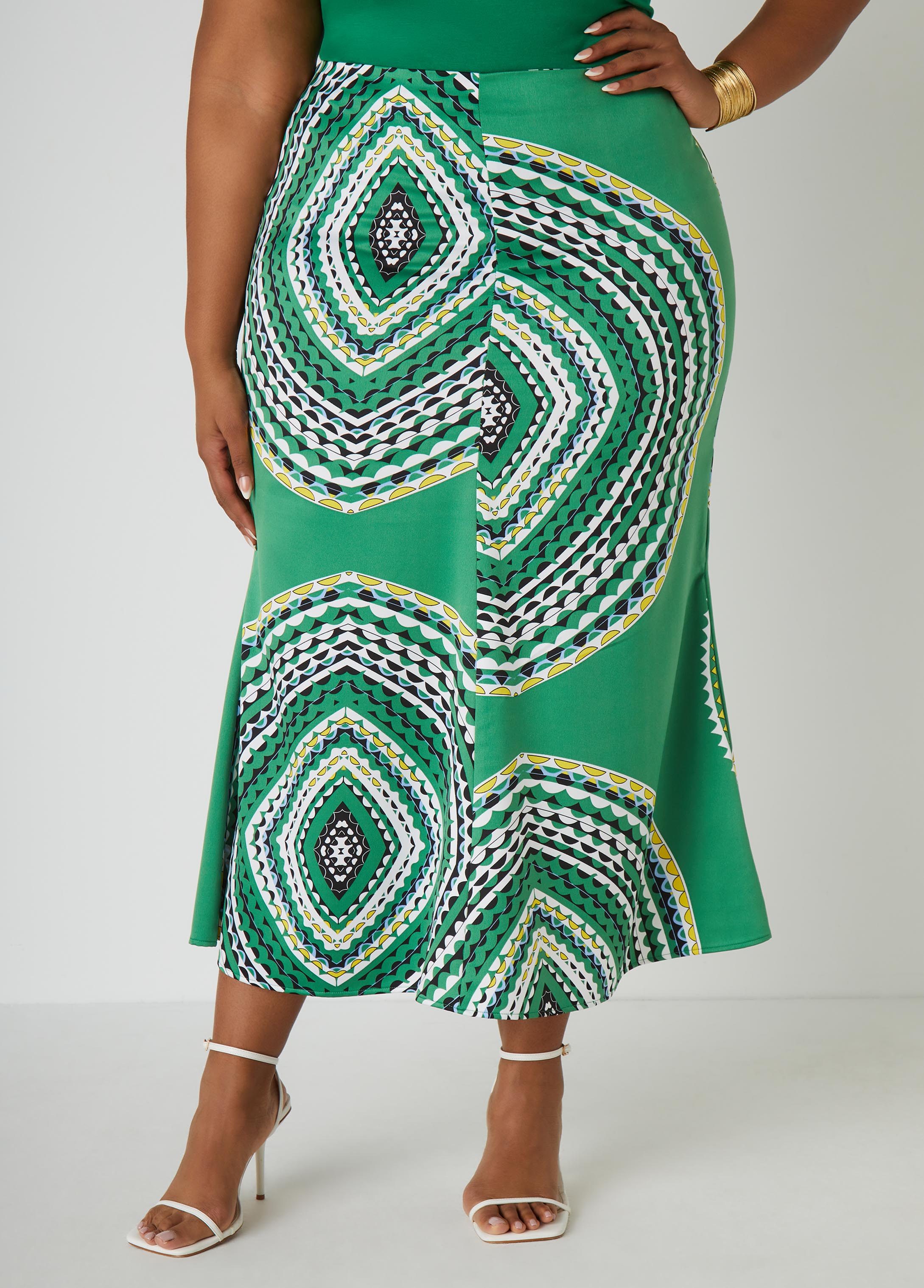 Circle print satin maxi skirt with elasticized waistband. Slip-on style. Can be worn as a two-piece set with matching top. Top sold separately.