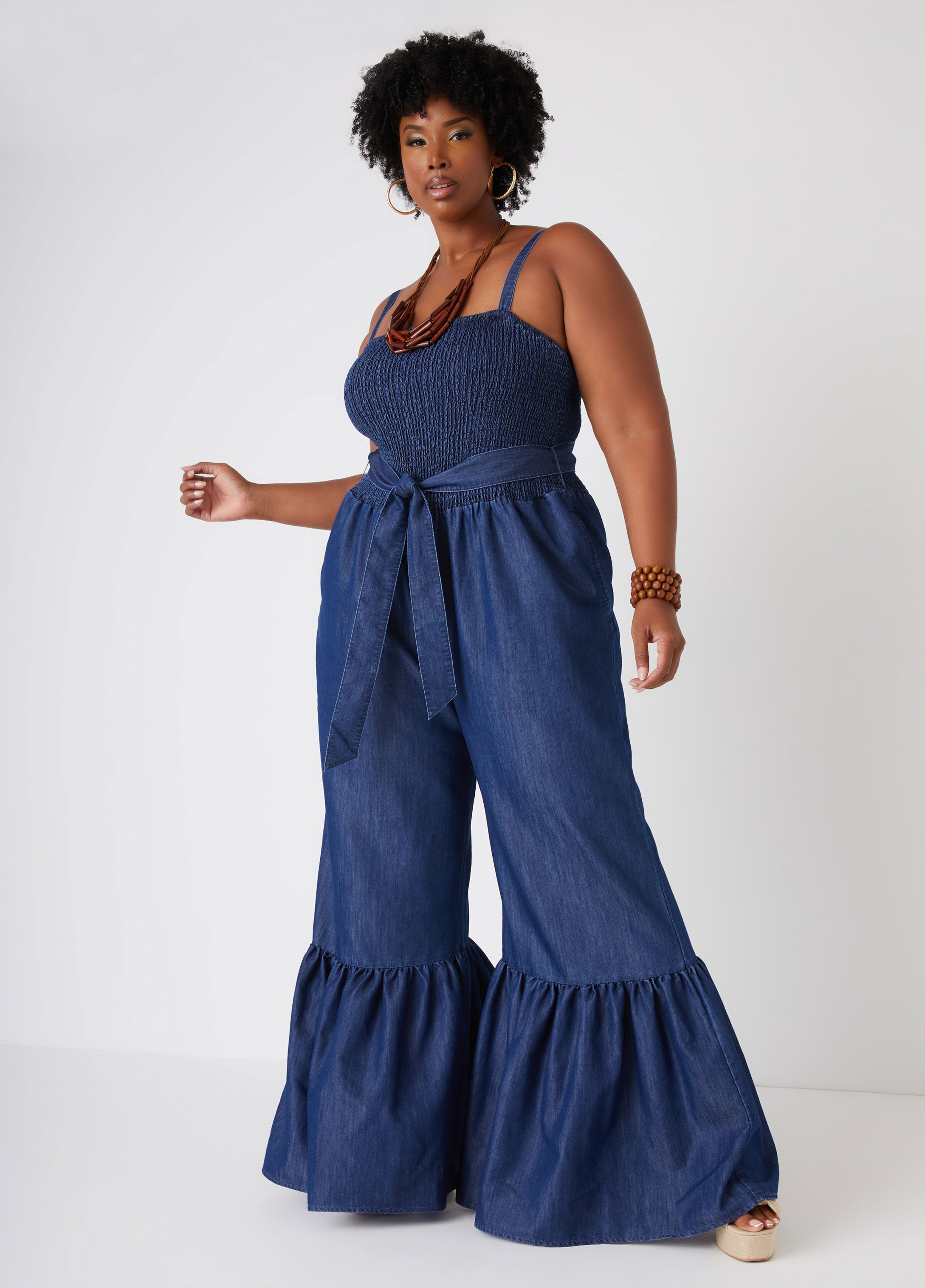 Blue jean bell bottom jumpsuit on sale